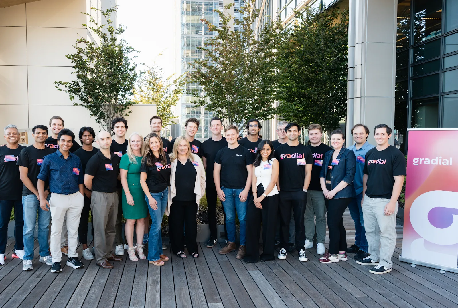 Gradial team standing together outdoors